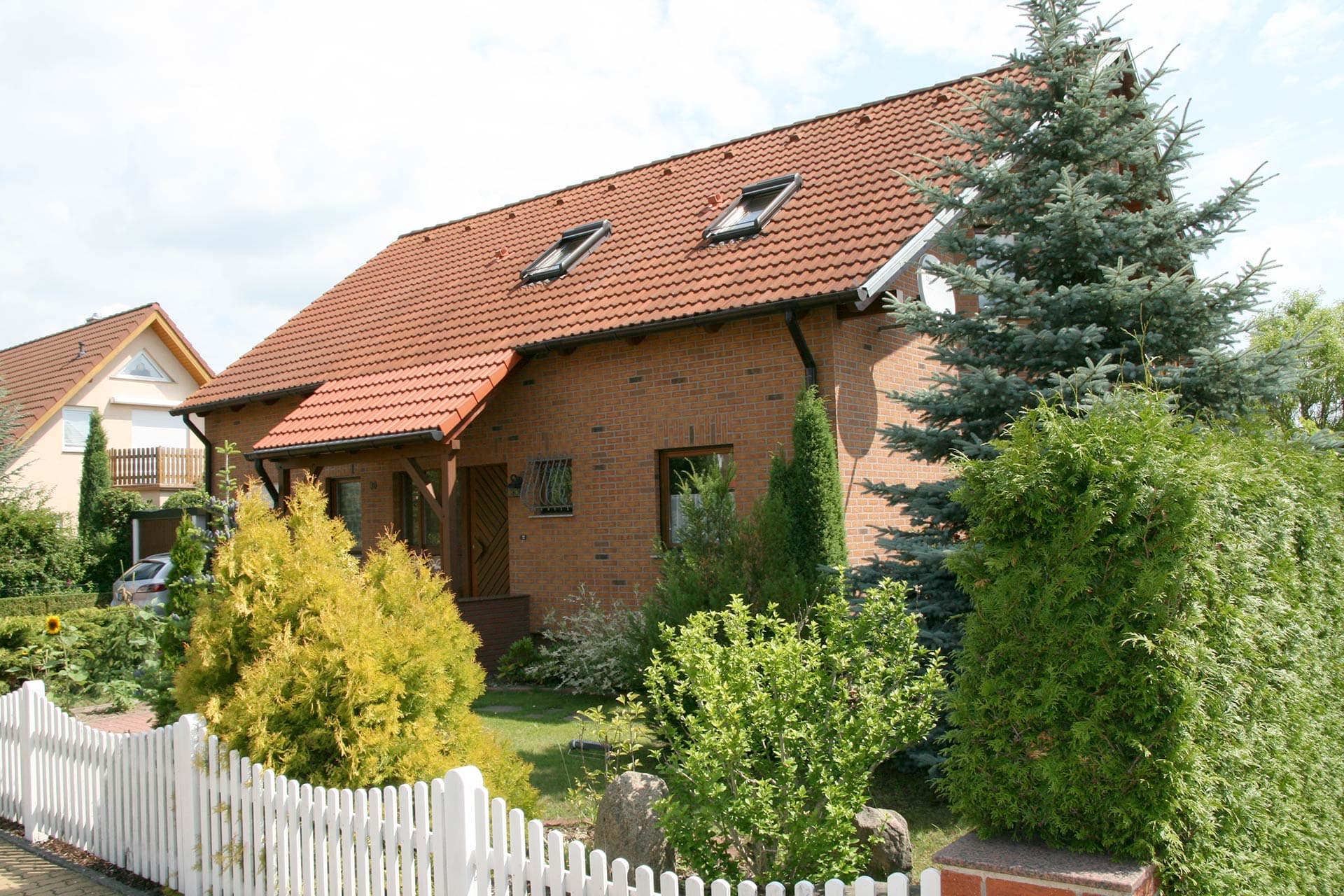 Wie lange hält eine Fassade nach professioneller Sanierung?